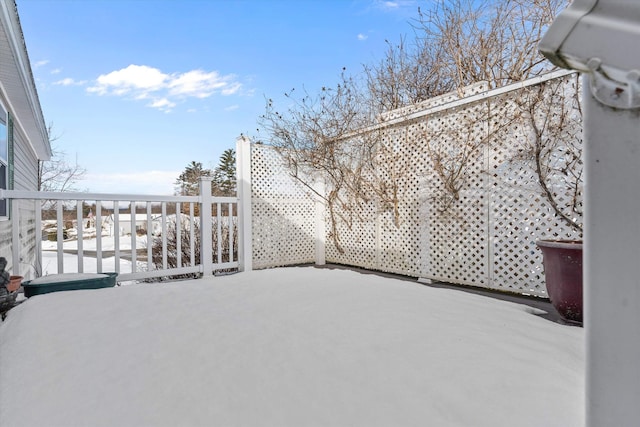 view of snow covered patio