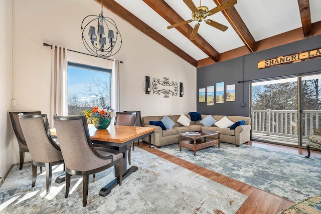 living room featuring beamed ceiling, high vaulted ceiling, and light hardwood / wood-style flooring