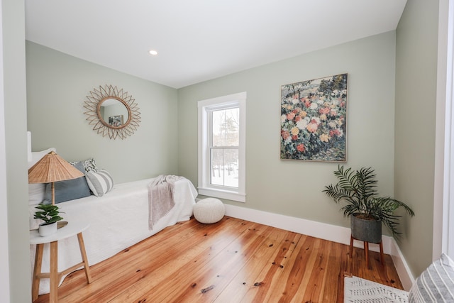 bedroom featuring hardwood / wood-style flooring