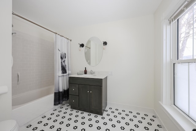 full bathroom with vanity, toilet, and shower / tub combo