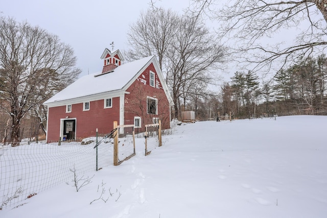 view of snow covered property