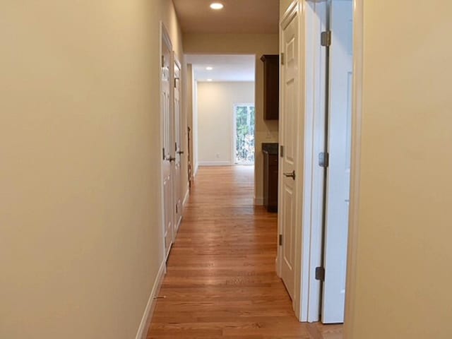 hall featuring light hardwood / wood-style flooring