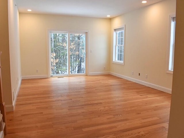 empty room featuring light hardwood / wood-style floors