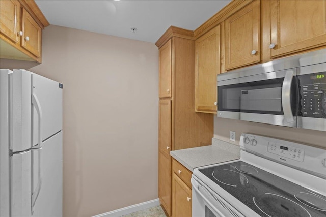 kitchen featuring white appliances