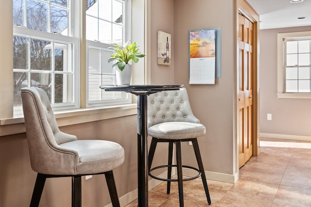 interior space with light tile patterned floors