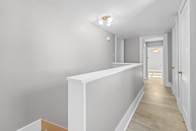 corridor featuring light hardwood / wood-style floors