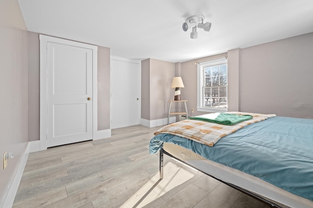 bedroom featuring light wood-type flooring