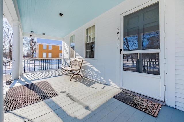 wooden terrace featuring a porch