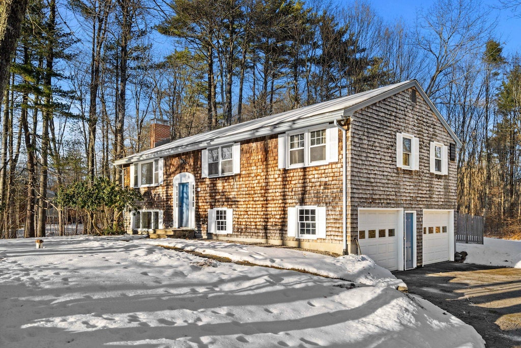 view of front of home with a garage