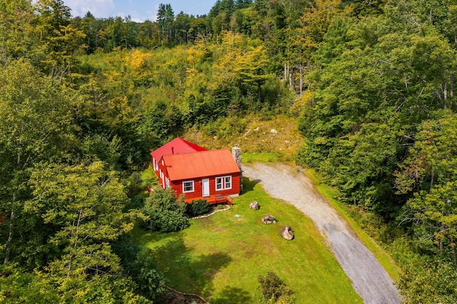 aerial view with a wooded view