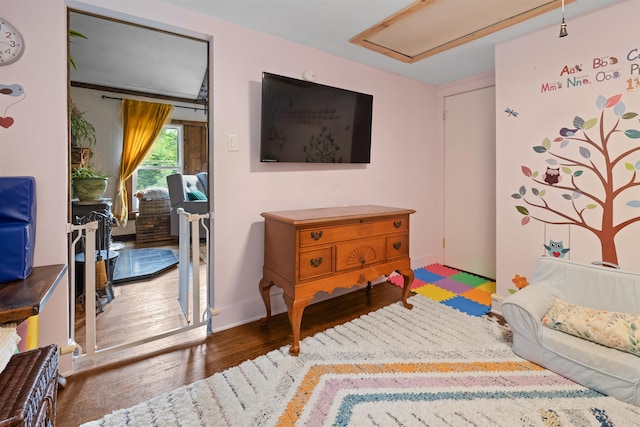 recreation room featuring light wood-type flooring