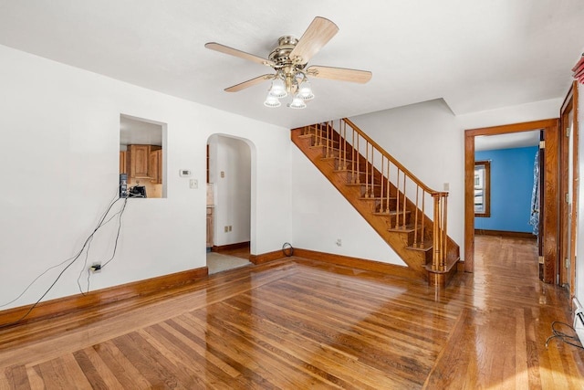 spare room featuring hardwood / wood-style floors and ceiling fan