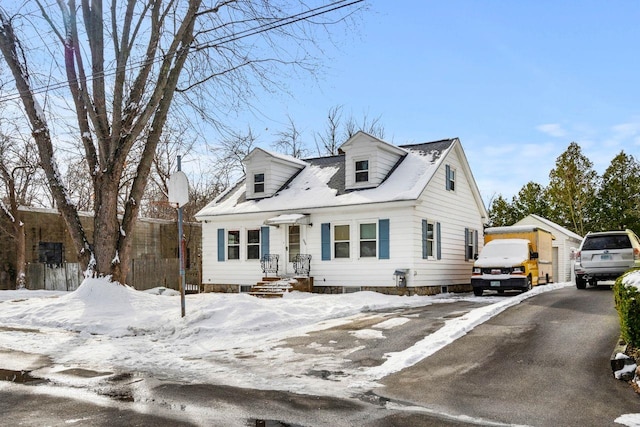 view of new england style home