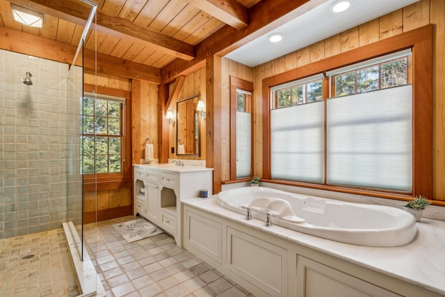 bathroom with vanity, wooden walls, independent shower and bath, and beamed ceiling