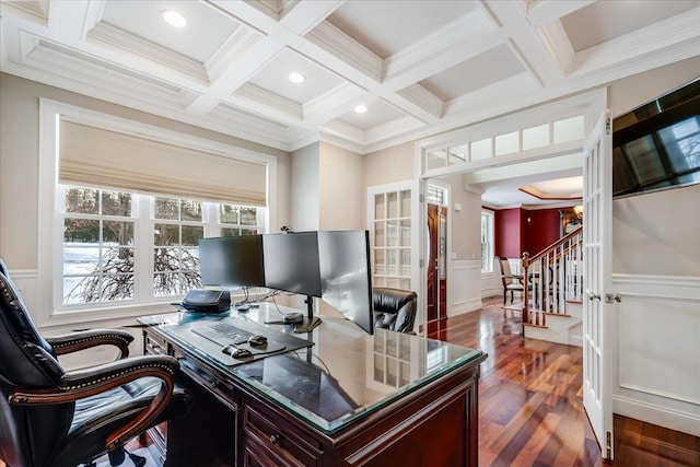 home office featuring coffered ceiling, hardwood / wood-style flooring, crown molding, and beamed ceiling