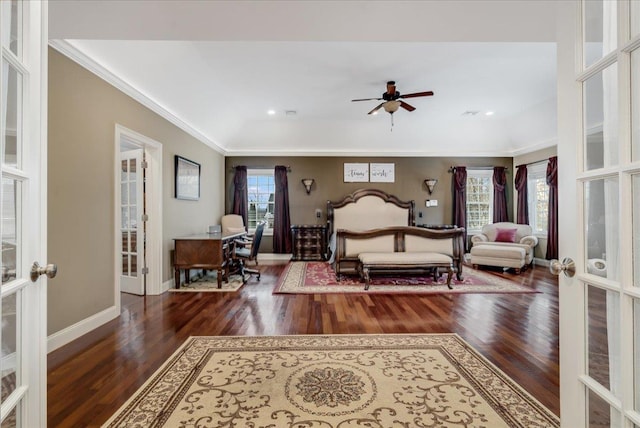 bedroom featuring multiple windows, crown molding, dark hardwood / wood-style floors, and french doors