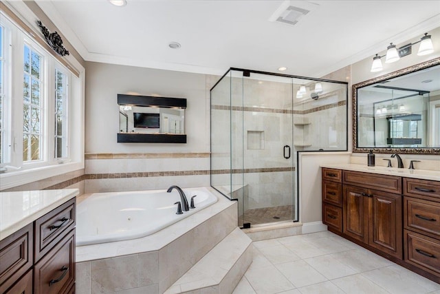 bathroom with crown molding, tile patterned floors, vanity, and separate shower and tub