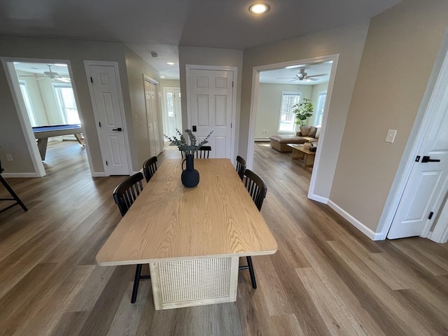 dining room with pool table and wood-type flooring