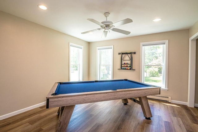 game room with baseboard heating, ceiling fan, dark hardwood / wood-style floors, and billiards