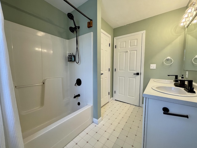 bathroom featuring vanity and shower / bathtub combination with curtain