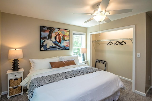 bedroom with ceiling fan, carpet flooring, and a closet