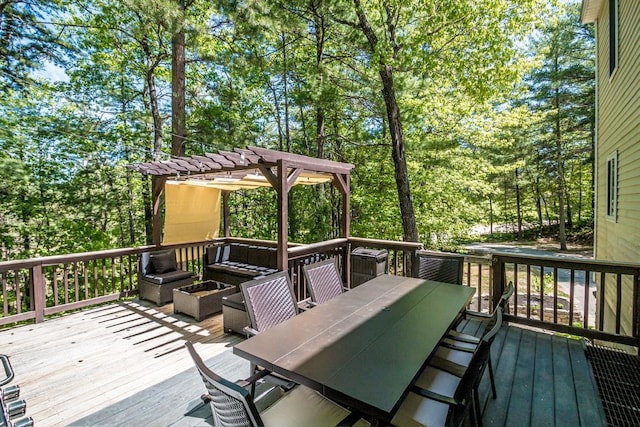 wooden deck featuring a pergola