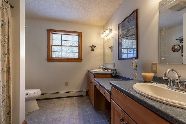 bathroom with vanity, baseboard heating, toilet, tile patterned floors, and a textured ceiling