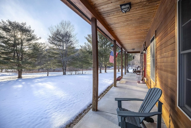 view of snow covered patio