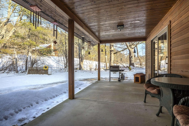 view of snow covered patio