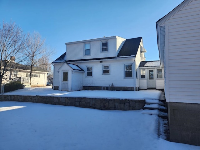 view of snow covered property