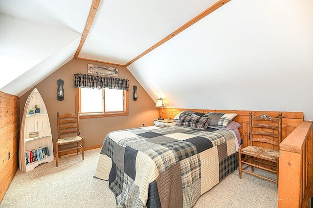 bedroom featuring light colored carpet and lofted ceiling