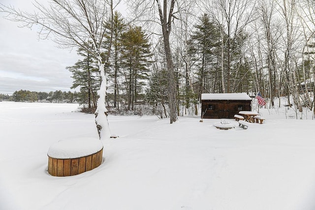 view of yard layered in snow