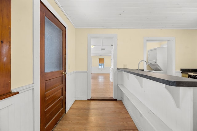 hall with light hardwood / wood-style flooring