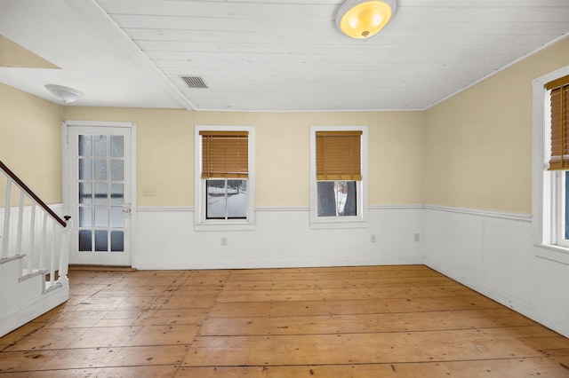 unfurnished room with light hardwood / wood-style floors