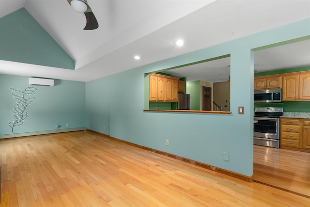 living room featuring vaulted ceiling, light hardwood / wood-style flooring, an AC wall unit, ceiling fan, and a baseboard heating unit