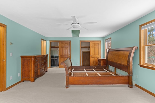 carpeted bedroom featuring ceiling fan