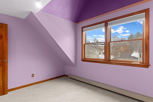 bonus room with lofted ceiling, light colored carpet, and baseboard heating