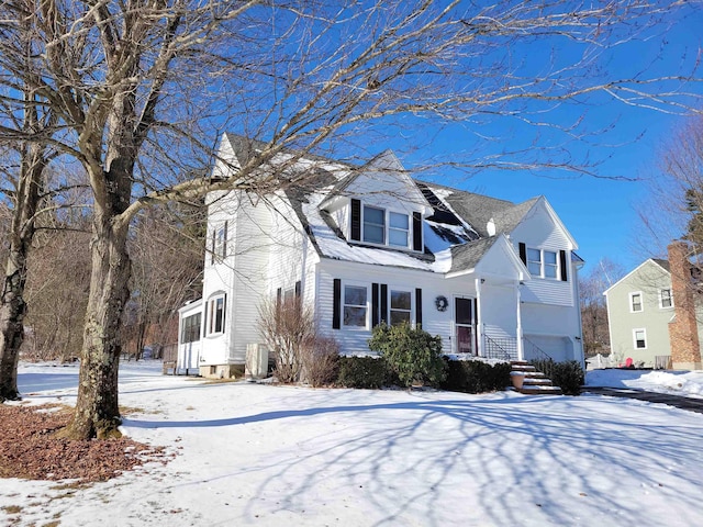 front of property with a garage