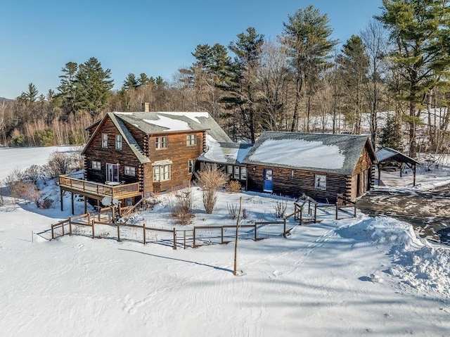 view of snow covered property