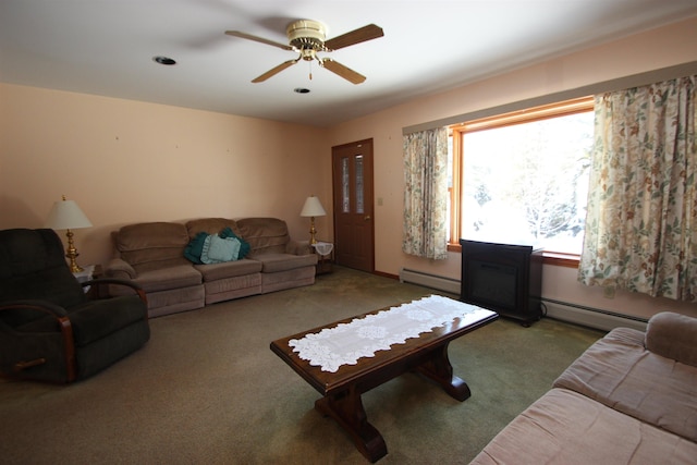 carpeted living room with a baseboard heating unit and ceiling fan