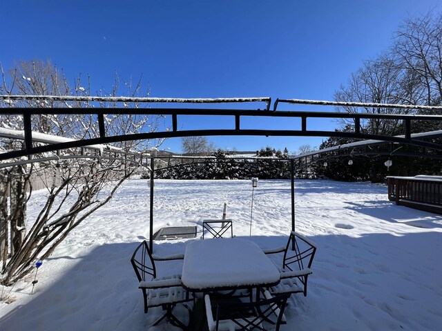 view of snow covered patio