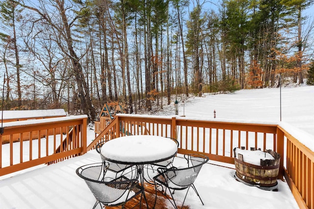 view of snow covered deck