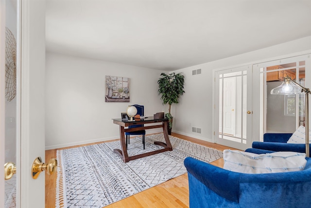 office space featuring wood-type flooring