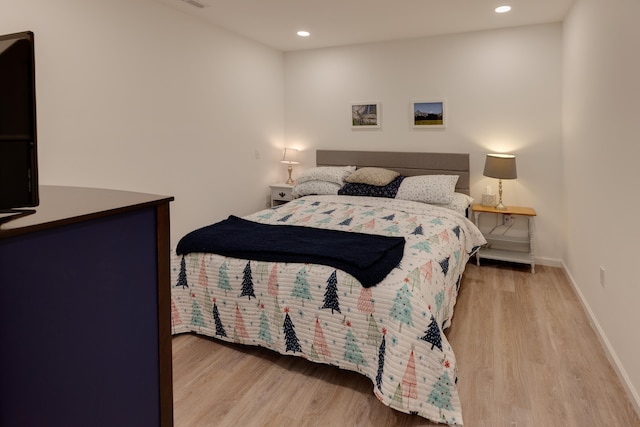 bedroom featuring light wood-type flooring