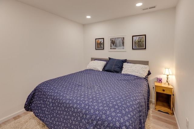 bedroom featuring light wood-type flooring