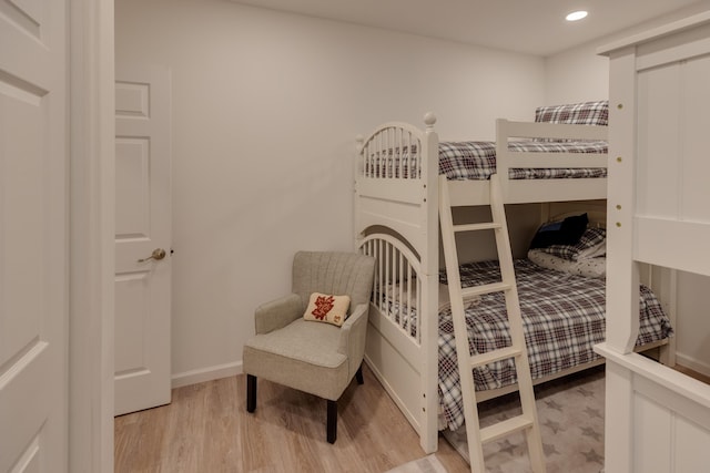 bedroom with light hardwood / wood-style floors