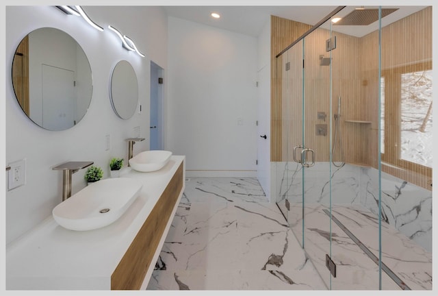 bathroom with walk in shower and vanity