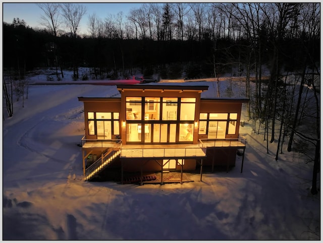 view of snow covered house