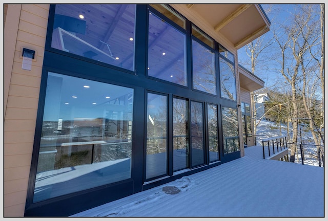 view of snow covered deck