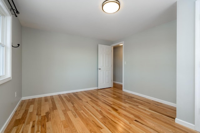 spare room featuring hardwood / wood-style flooring